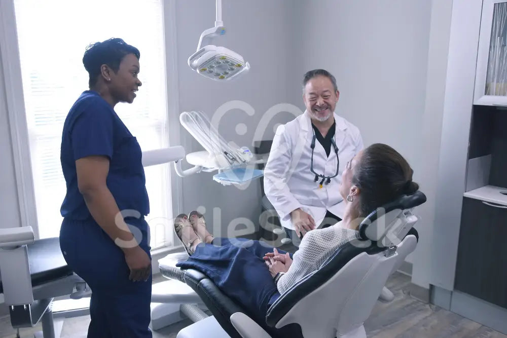 Doctor and Assistant Focused on Patient’s Procedure - Clinician Images